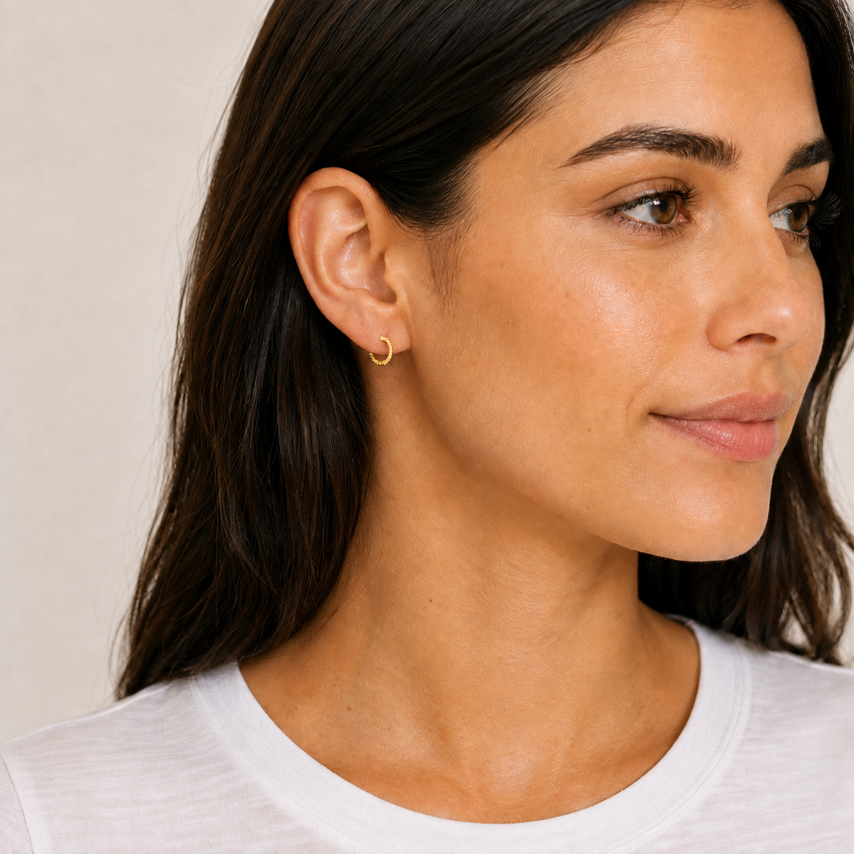 Twisted Hoop Earrings in Gold