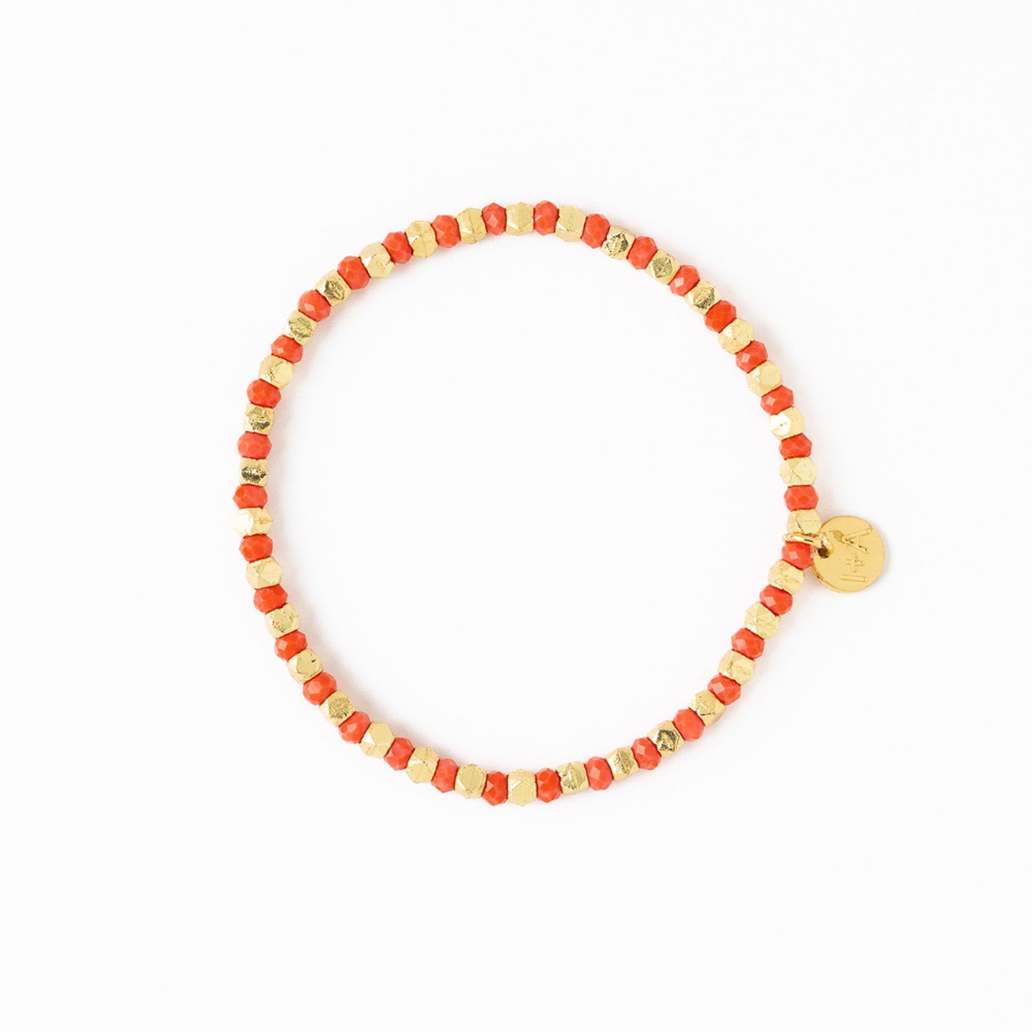 Louise Crystal Stretch Bracelet in Coral + Gold by Ink & Alloy