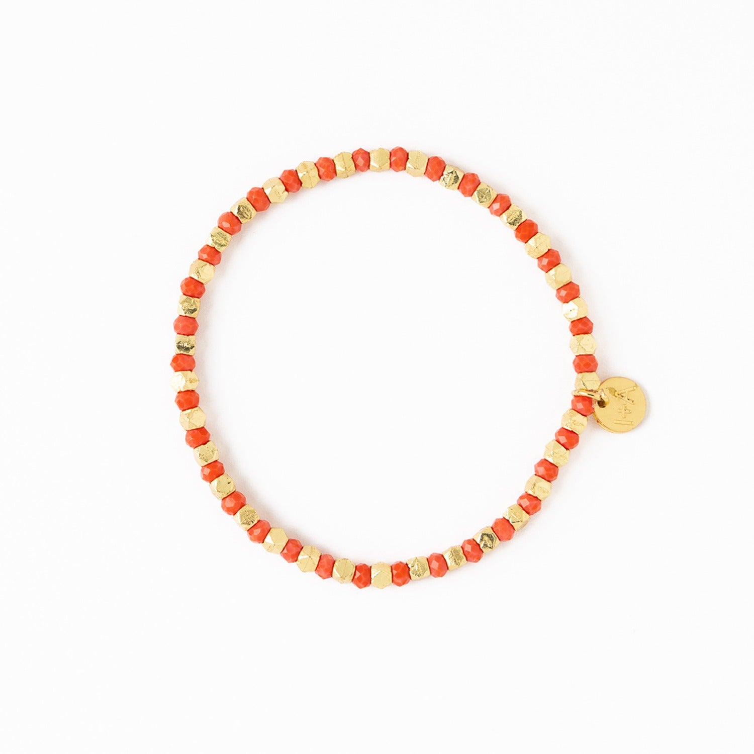 Louise Crystal Stretch Bracelet in Coral + Gold by Ink & Alloy