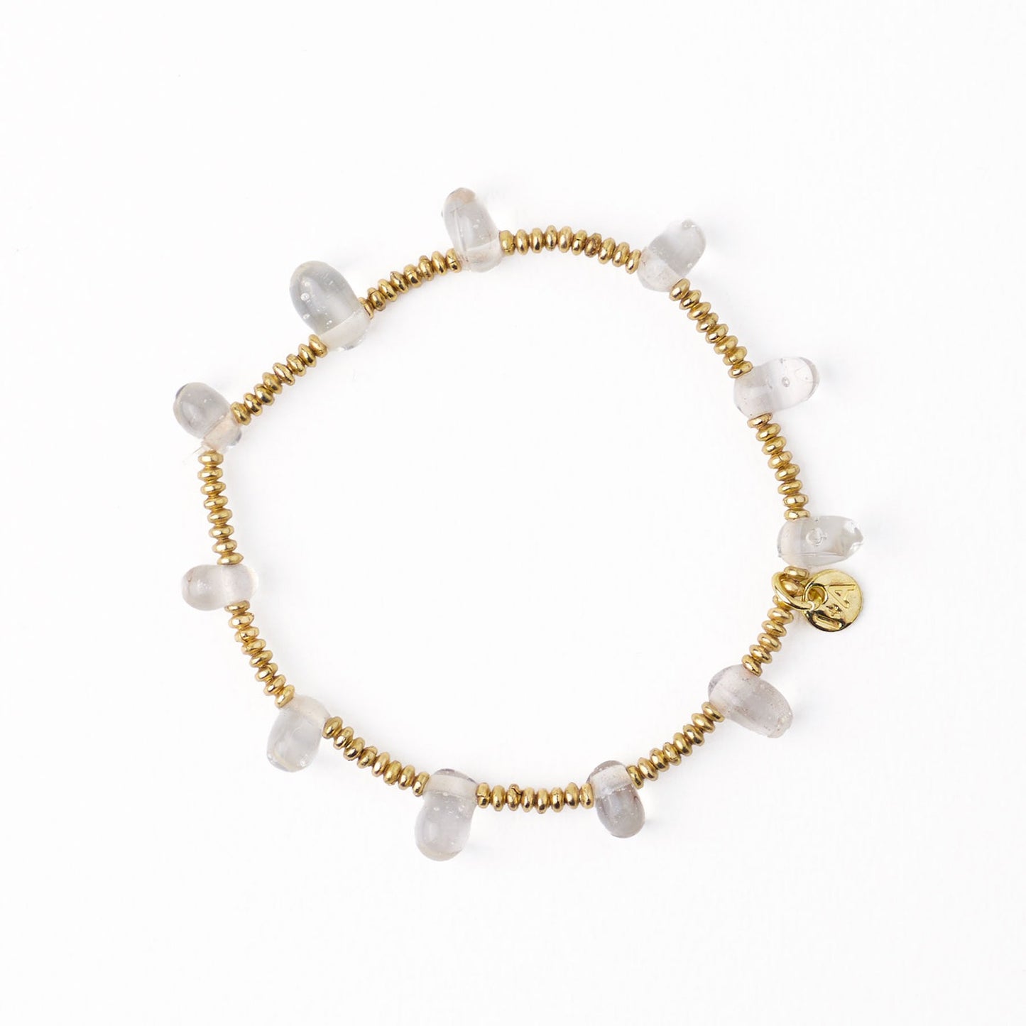 Hope Brass Stretch Bracelet with Glass Beads in Clear by Ink & Alloy