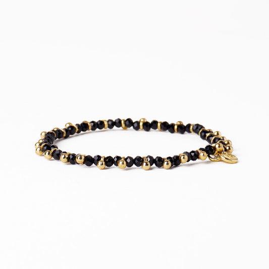 Kami Crystal + Brass Charm Stretch Bracelet in Black + Gold by Ink & Alloy