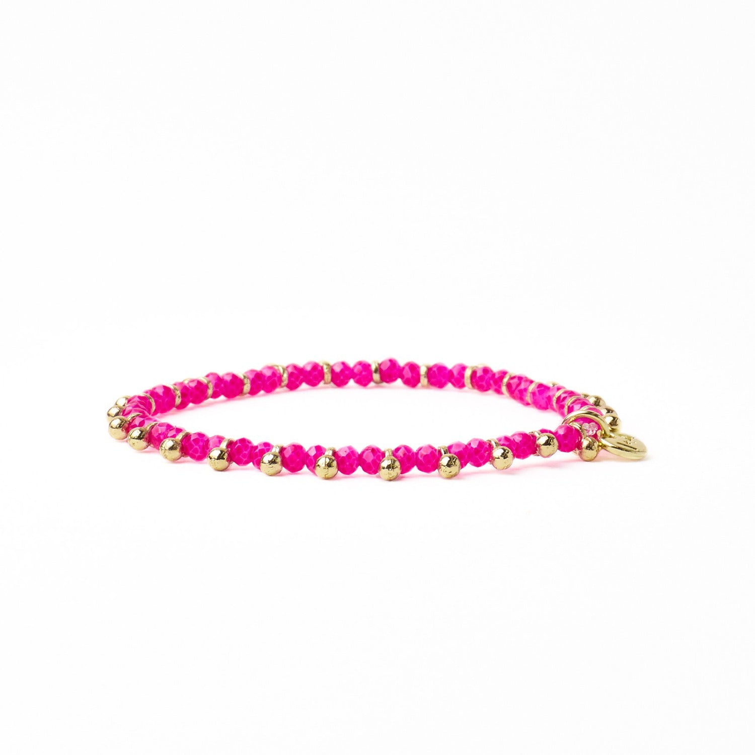 Kami Crystal + Brass Charm Stretch Bracelet in Hot Pink + Gold by Ink & Alloy