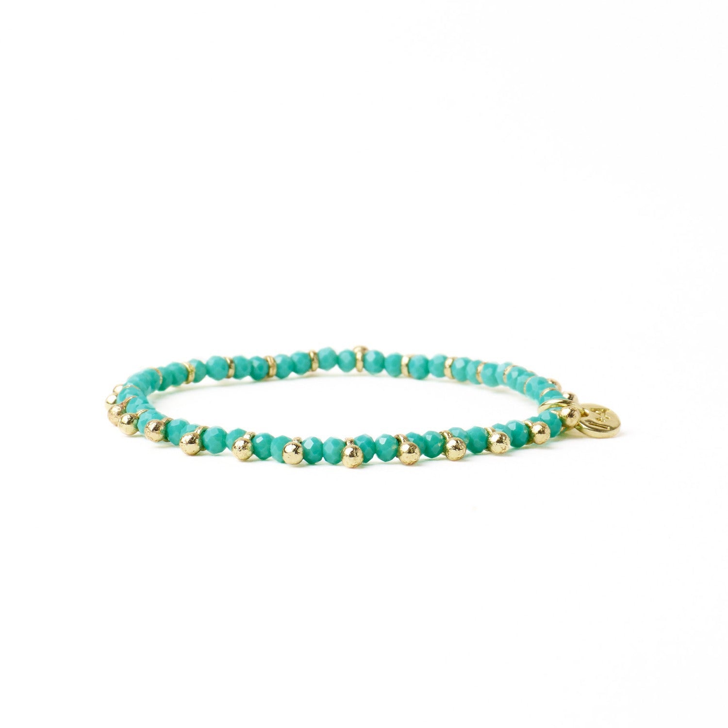 Kami Crystal + Brass Charm Stretch Bracelet in Teal + Gold by Ink & Alloy